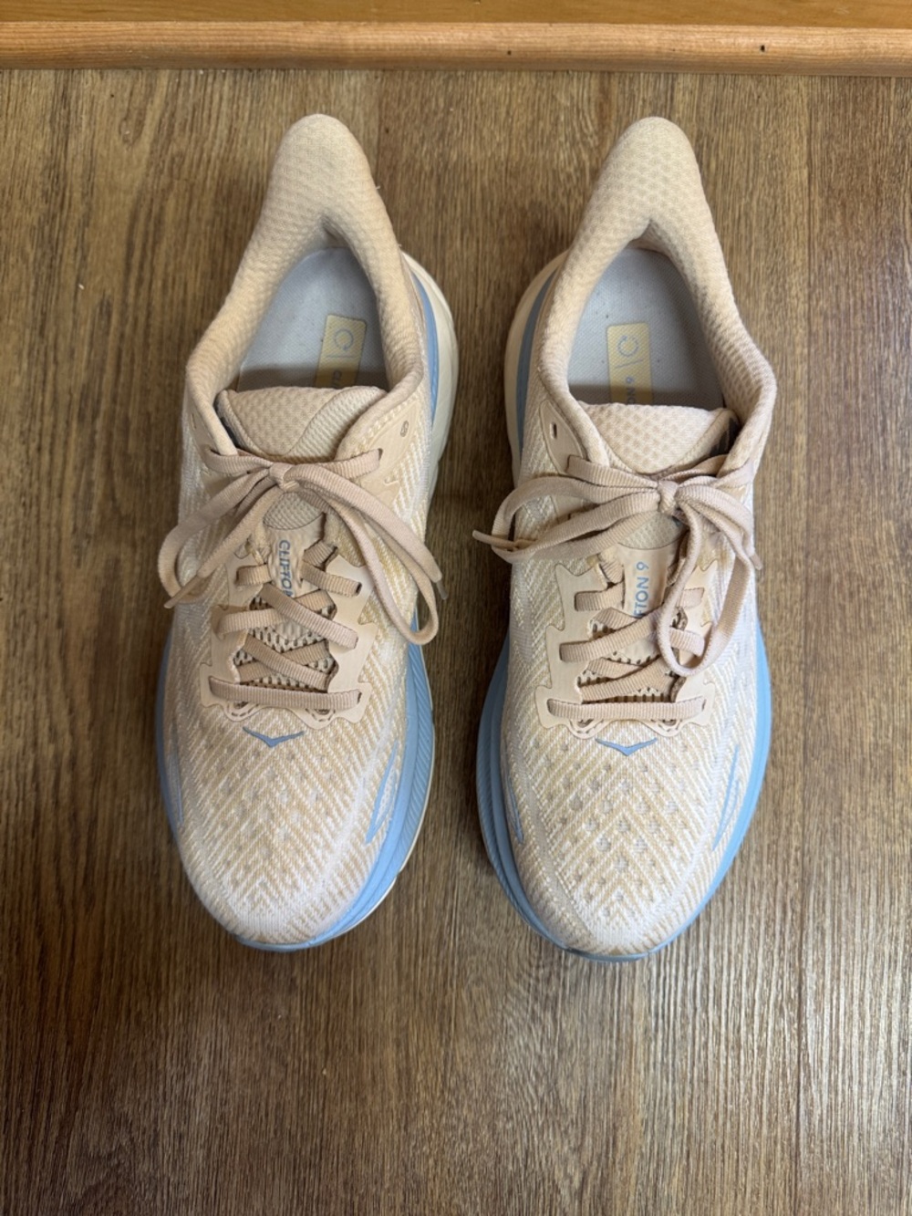 Hoka Women's Running Shoes in Pale Pink with Light Blue Accents